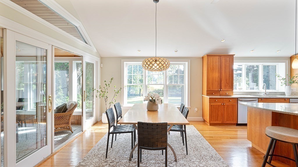 84 Wildwood Drive Needham, MA 02492 - Photo 5 of 36 a view of a dining room with furniture window and wooden floor