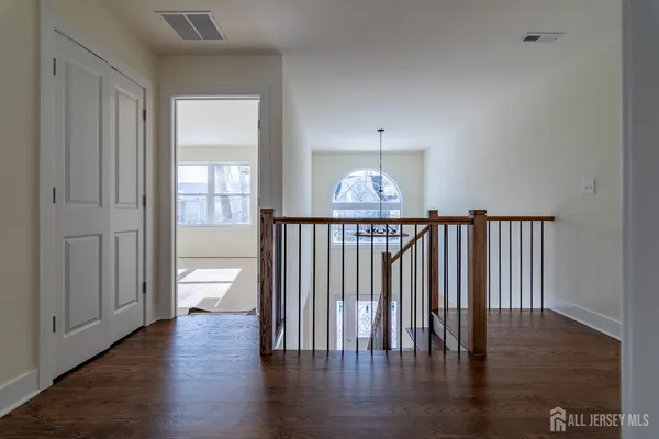 a bathroom with a toilet sink and a window