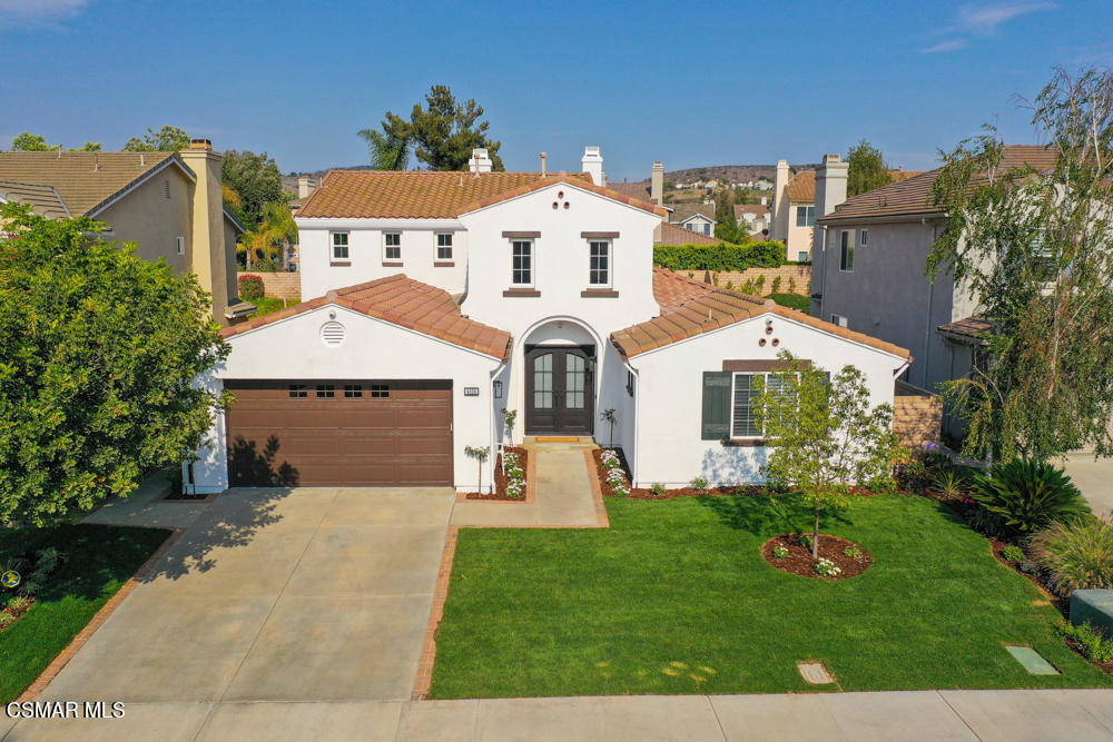 4630 Rio Bravo Court Moorpark, CA 93021 - Photo 2 of 58 front view of a house with a yard