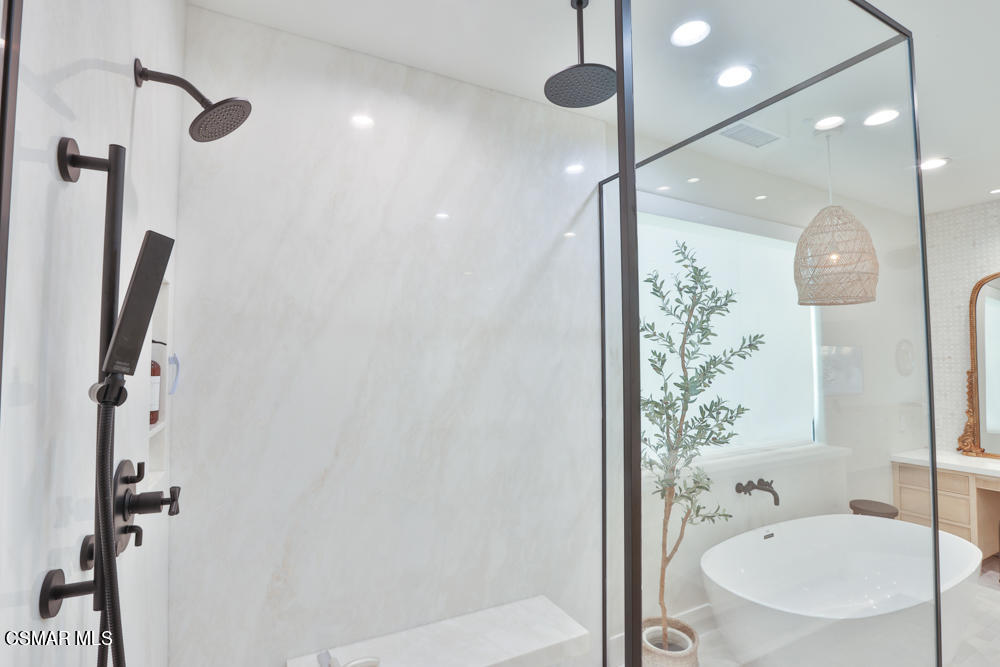 4630 Rio Bravo Court Moorpark, CA 93021 - Photo 42 of 58 a bathroom with a shower and a sink