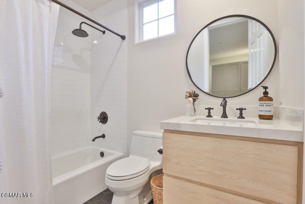 4630 Rio Bravo Court Moorpark, CA 93021 - Photo 45 of 58 a bathroom with a sink a toilet and a mirror