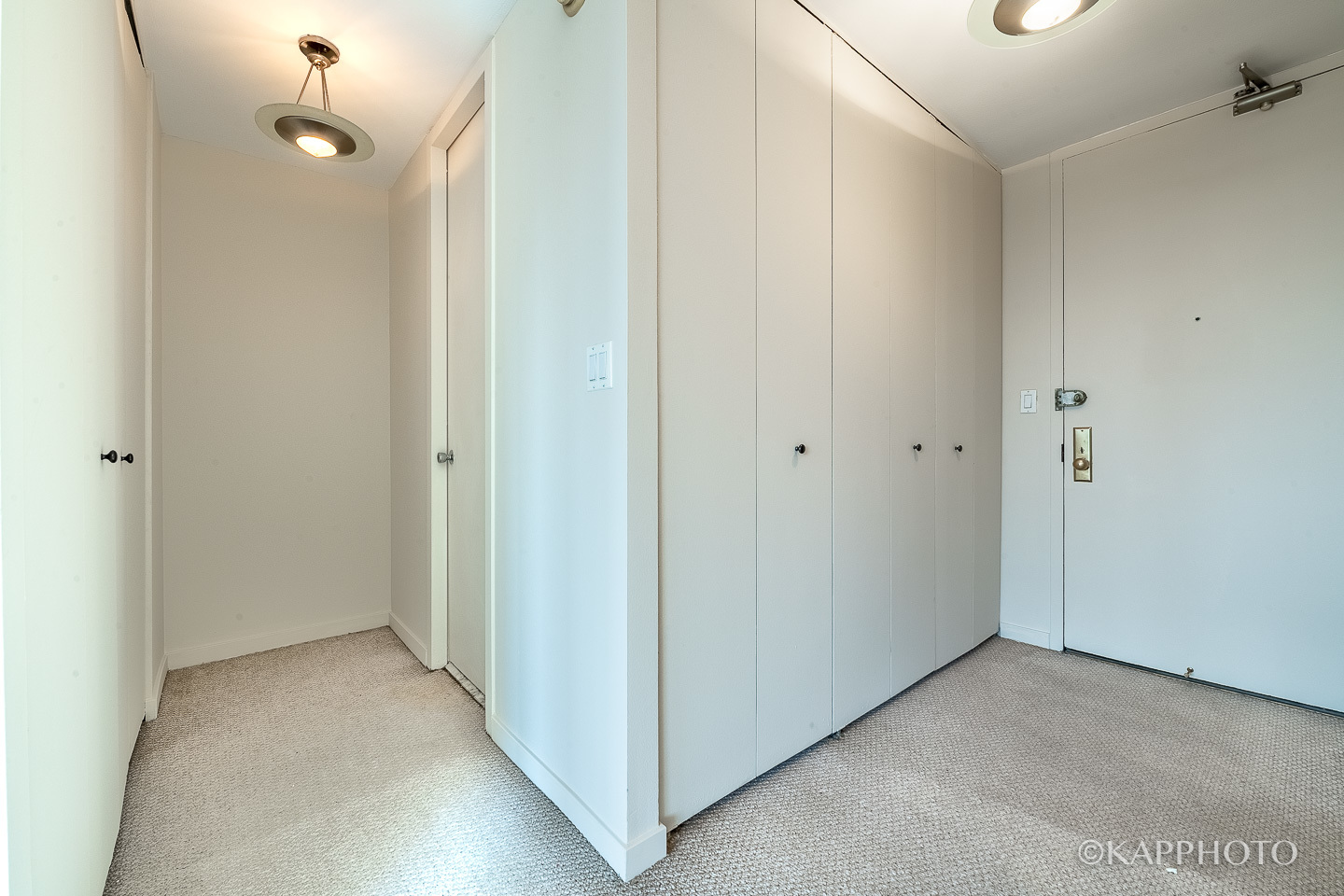 655 West Irving Park Road, Unit 1505 Chicago, IL 60613 - Photo 13 of 26 a view of a hallway with wooden floor