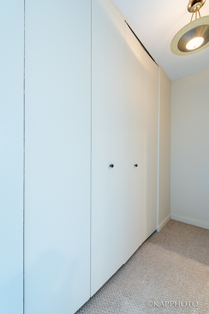 655 West Irving Park Road, Unit 1505 Chicago, IL 60613 - Photo 14 of 26 a view of a room with a hallway