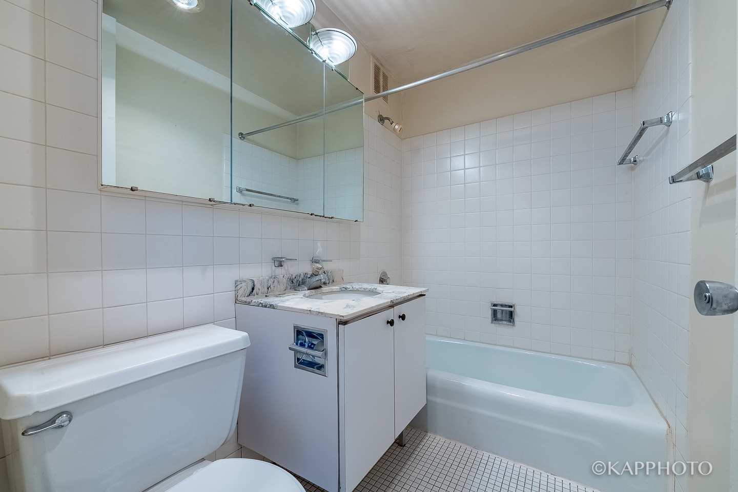 655 West Irving Park Road, Unit 1505 Chicago, IL 60613 - Photo 18 of 26 a bathroom with a sink a toilet and shower