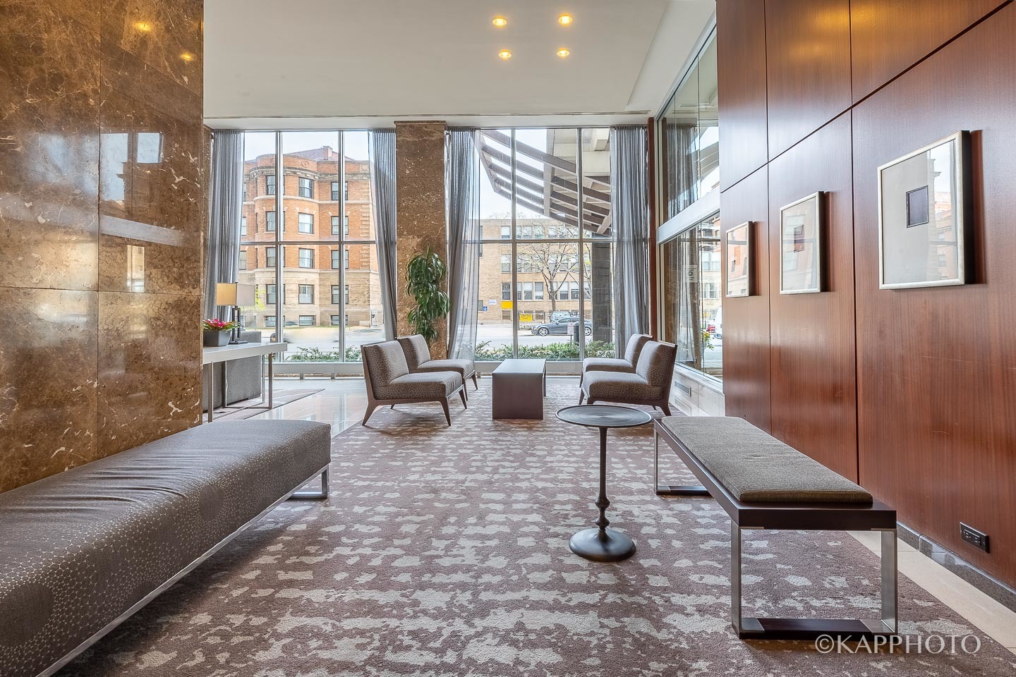 655 West Irving Park Road, Unit 1505 Chicago, IL 60613 - Photo 24 of 26 a living room with furniture and a floor to ceiling window