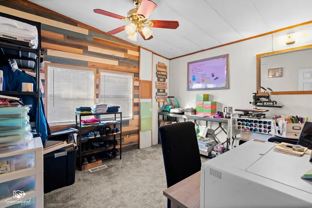 a view of a workspace with furniture