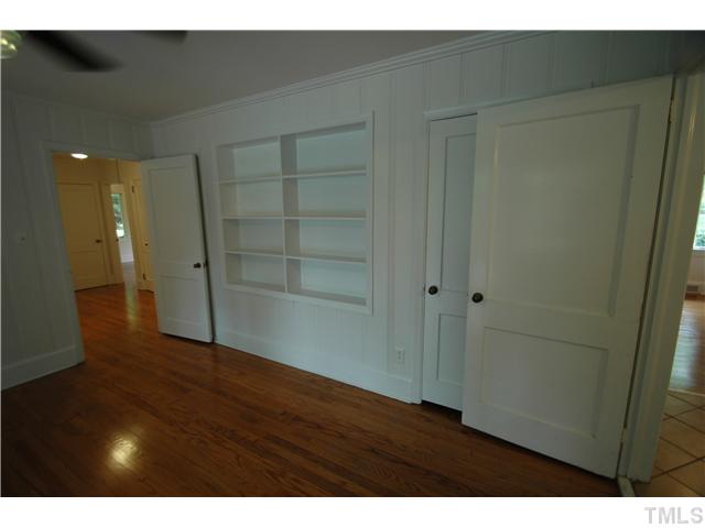 116 Lord Ashley Road Raleigh, NC 27610 - Photo 12 of 25 a view of an empty room with wooden floor