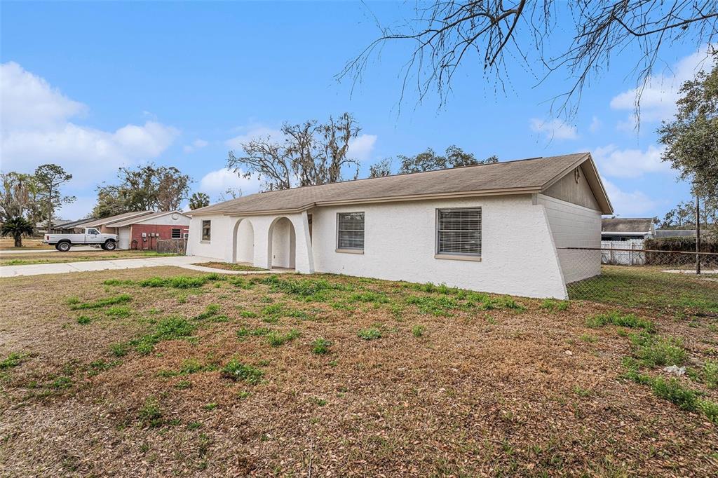 2527 Ridge Top Way Valrico, FL 33594 - Photo 2 of 29 a view of a house with a backyard