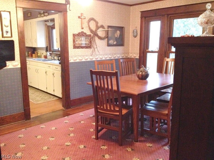 5650 Leroy Road Wakeman, OH 44889 - Photo 10 of 25 Beautiful natural woodwork and black walnut floors
