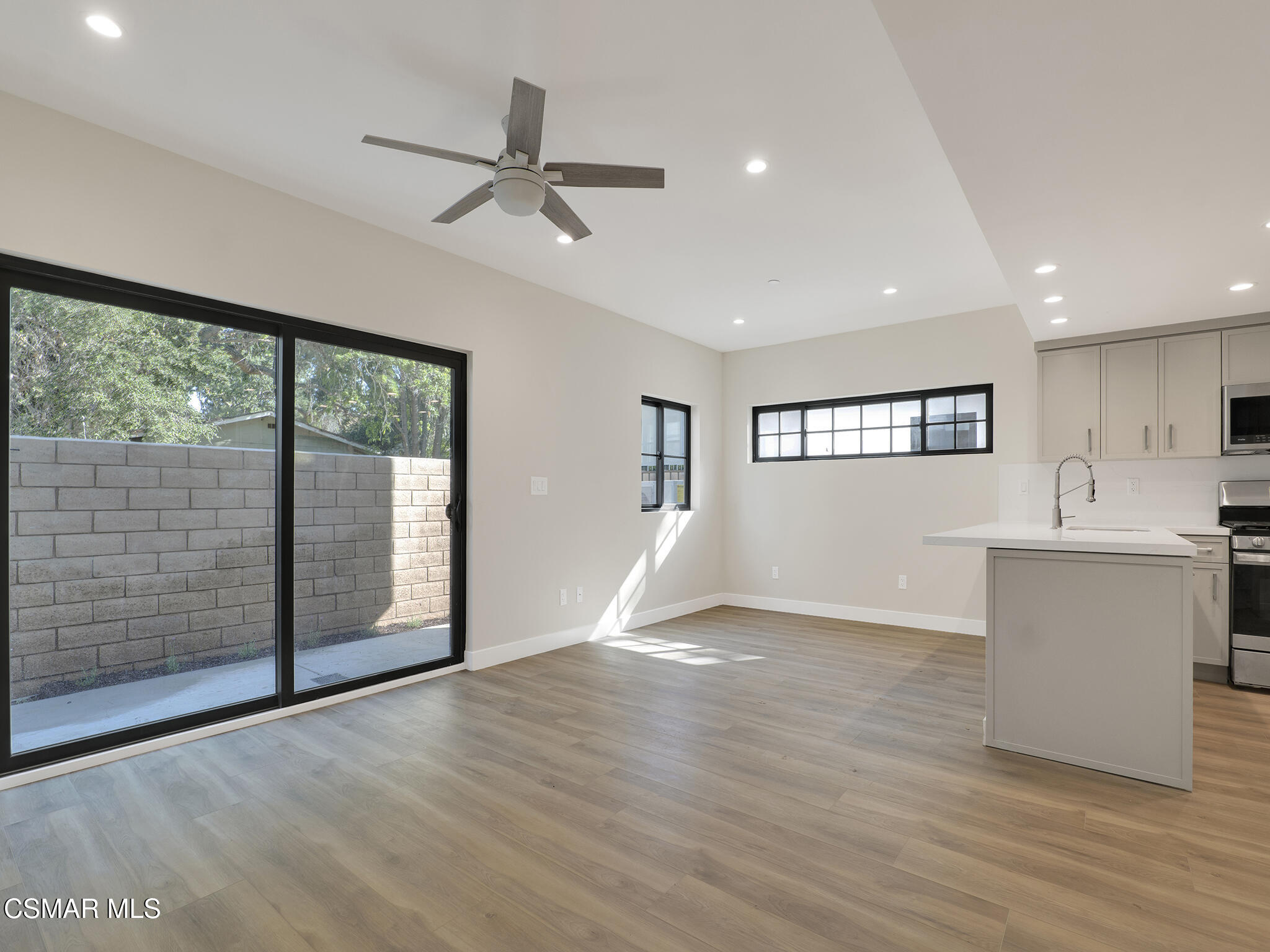 3190 Los Robles Road, Unit C Thousand Oaks, CA 91362 - Photo 3 of 14 a view of empty room with wooden floor and fan