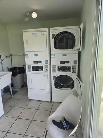 a kitchen with a stove a washer and dryer