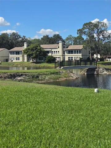 a view of a house with a big yard