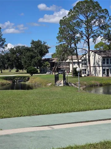 a view of a garden with houses