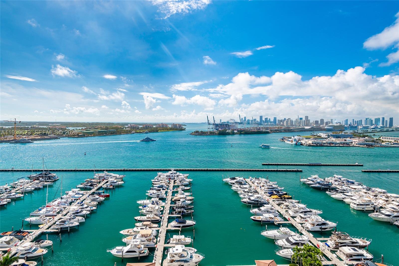 90 Alton Road, Unit 2008 Miami Beach, FL 33139 - Photo 2 of 28 a view of a golf course with a lake view