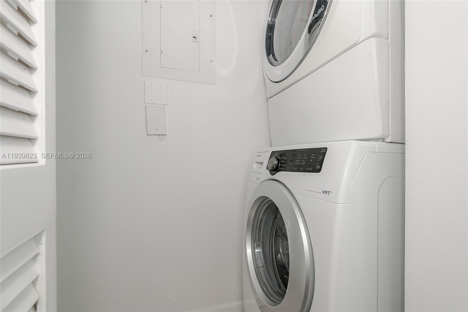 90 Alton Road, Unit 2008 Miami Beach, FL 33139 - Photo 25 of 28 a close up view of a washer and dryer