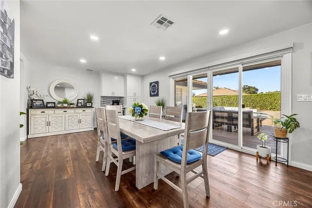 a open kitchen with a table and chairs