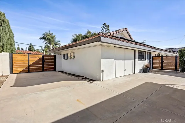 a front view of a house with a garage