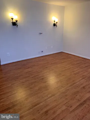 an empty room with a empty space walk in closet