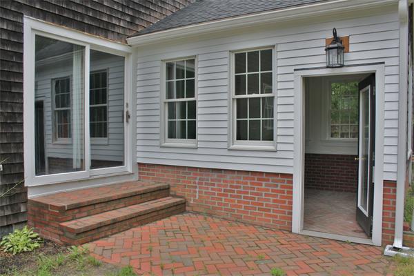 108 Telegraph Road Dennis, MA 02639 - Photo 3 of 19 a view of a brick house with a large window