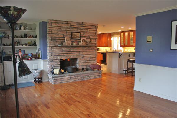 108 Telegraph Road Dennis, MA 02639 - Photo 4 of 19 a living room with furniture and a fireplace