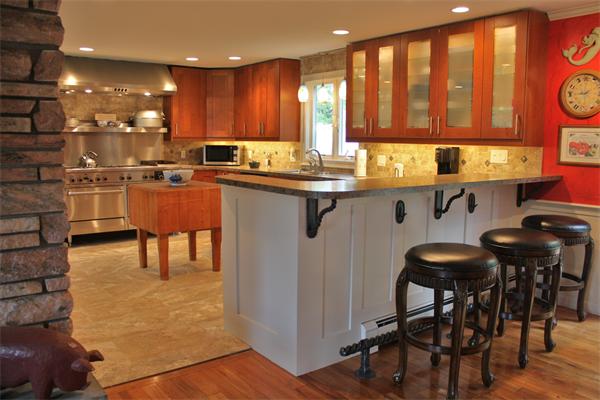 108 Telegraph Road Dennis, MA 02639 - Photo 6 of 19 a kitchen with stainless steel appliances granite countertop table chairs sink and cabinets