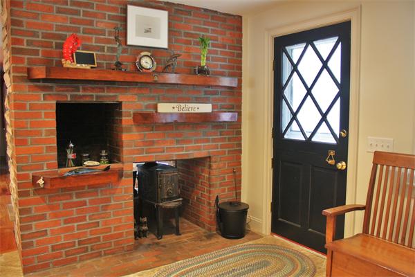 108 Telegraph Road Dennis, MA 02639 - Photo 8 of 19 a living room with furniture a window and potted plants