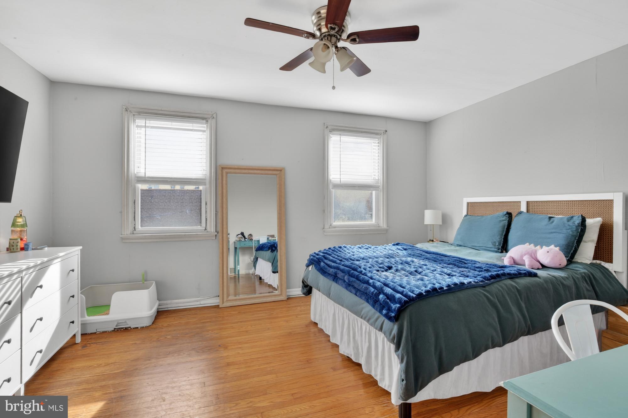 3048 Miller Street Philadelphia, PA 19134 - Photo 16 of 22 a bedroom with a bed and a window