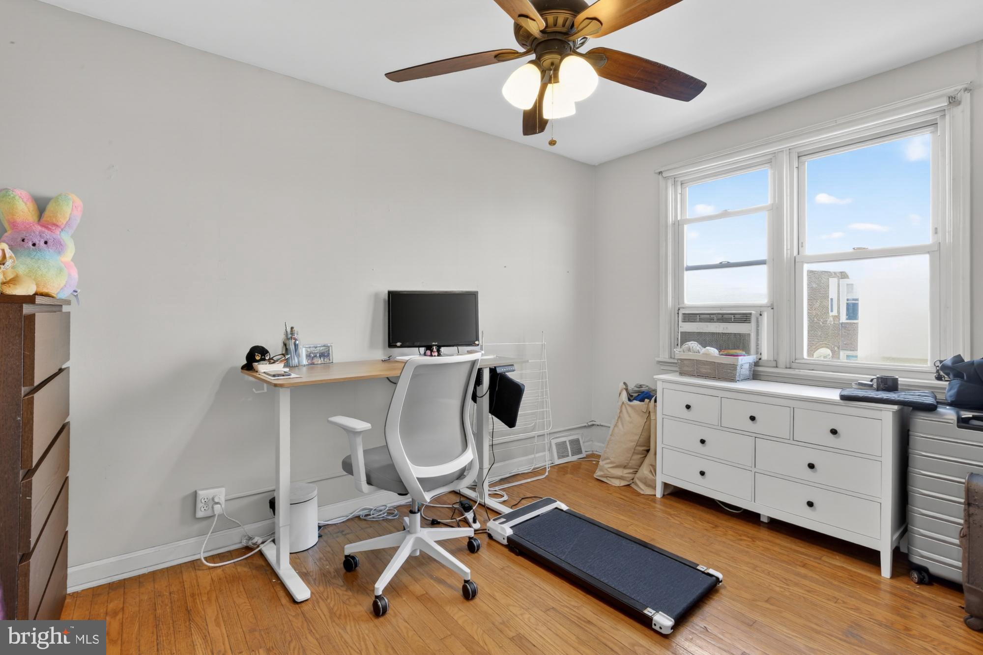 3048 Miller Street Philadelphia, PA 19134 - Photo 19 of 22 a view of workspace with wooden floor windows