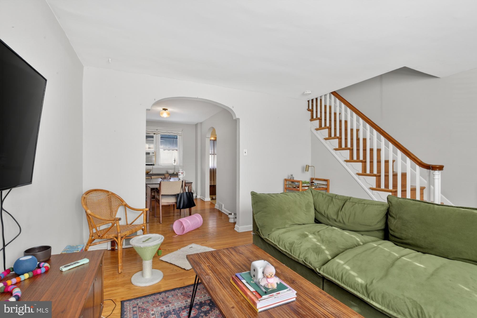 3048 Miller Street Philadelphia, PA 19134 - Photo 5 of 22 a living room with furniture and a flat screen tv