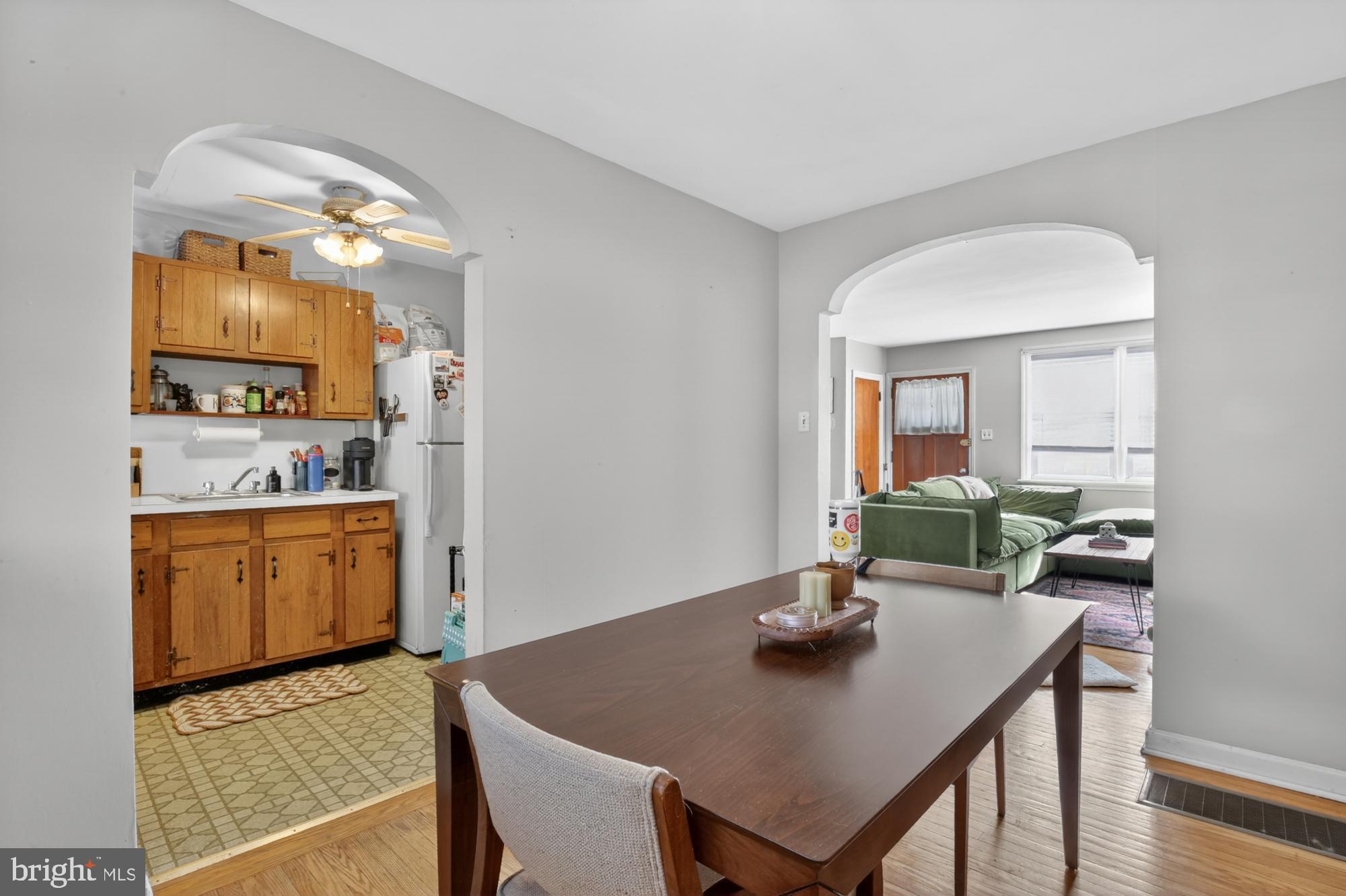 3048 Miller Street Philadelphia, PA 19134 - Photo 8 of 22 a kitchen with a table and chairs in it
