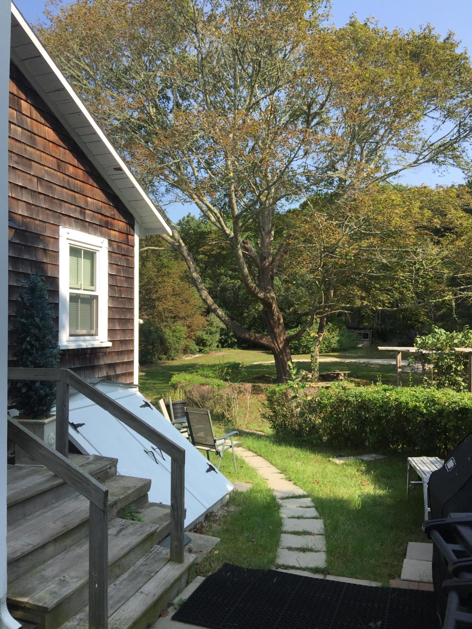 77 Brick Kiln Road Falmouth, MA 02536 - Photo 2 of 10 a view of a house with pool