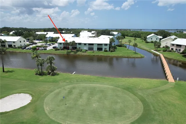 a view of a lake with a house