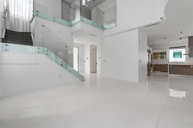 a kitchen with a sink and a window