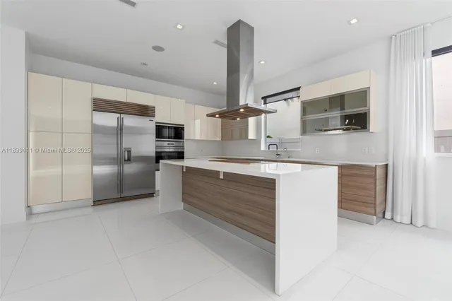 a bathroom with a toilet sink and a mirror