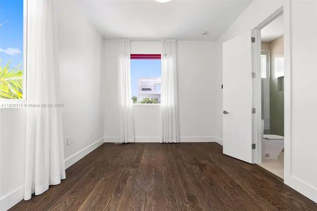 an aerial view of a city with lots of residential buildings