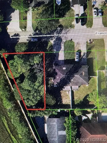 an outdoor space with lots of plants and vegetables