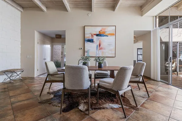 a view of a dining room with furniture