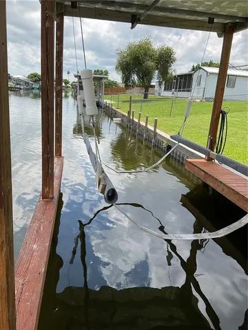 a view of a backyard of the house
