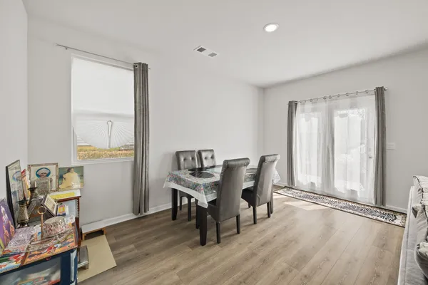 a workspace with furniture and wooden floor