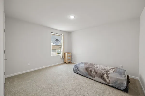 a living room with furniture and window