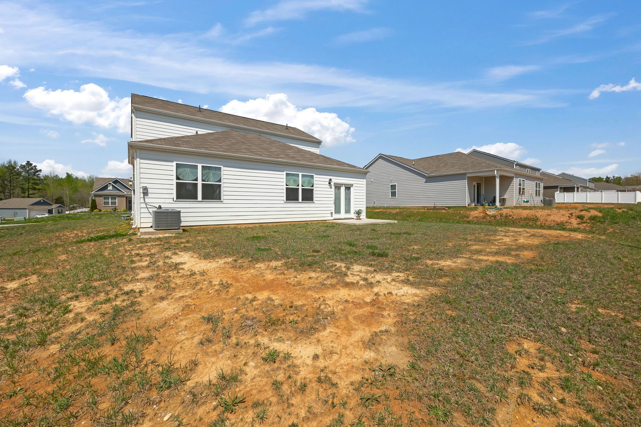 301 Oliver Way Baxter, TN 38544 - Photo 6 of 26 a front view of a house with a yard