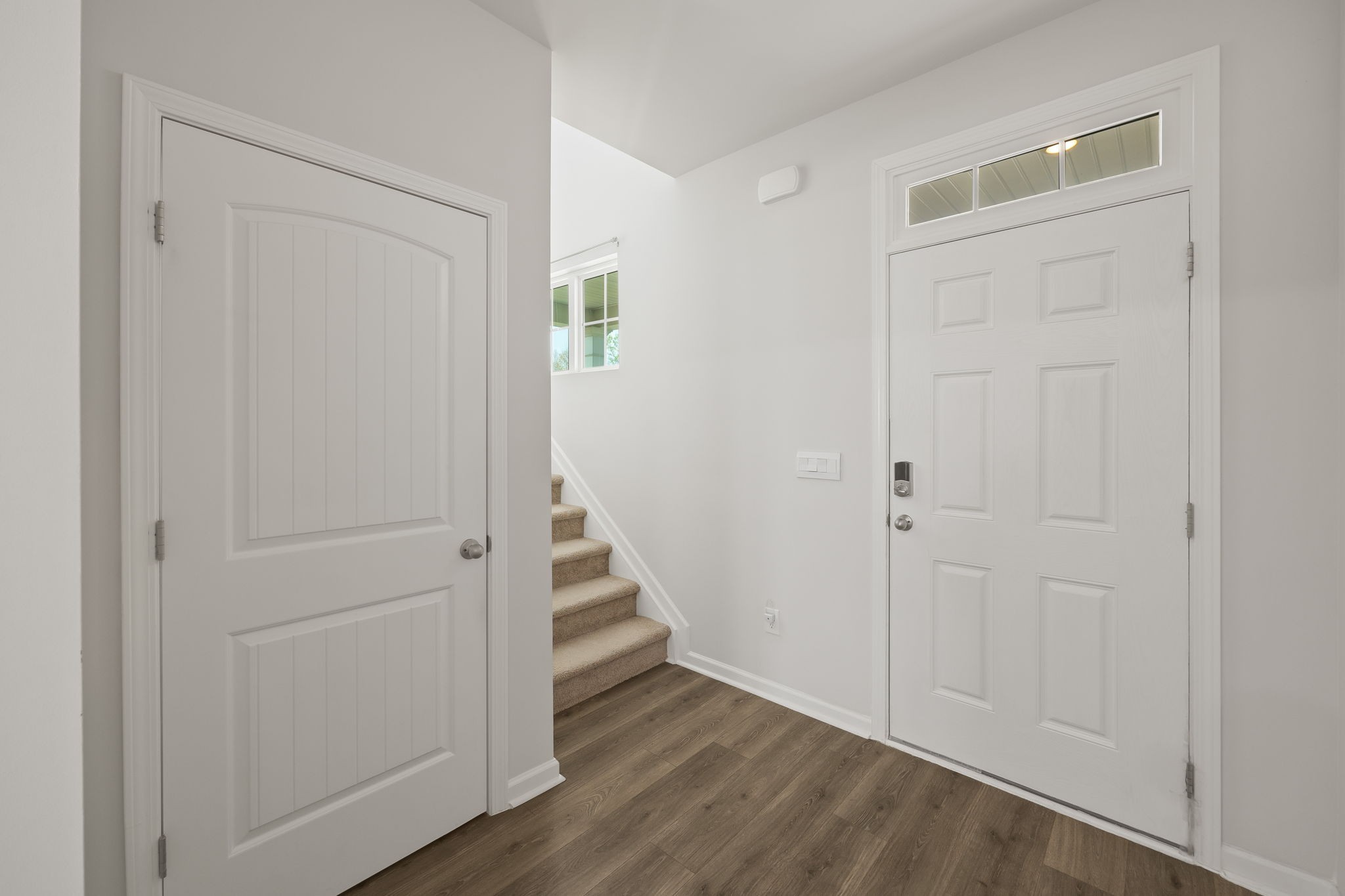 301 Oliver Way Baxter, TN 38544 - Photo 7 of 26 a view of a hallway with wooden floor