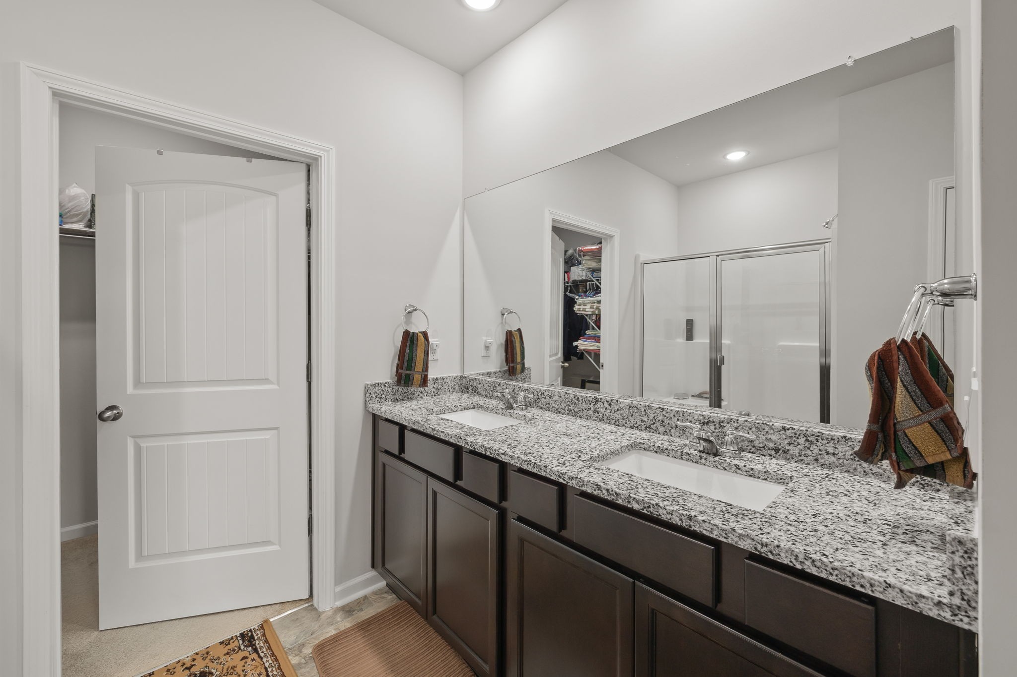 301 Oliver Way Baxter, TN 38544 - Photo 10 of 26 a bathroom with a granite countertop sink and a mirror