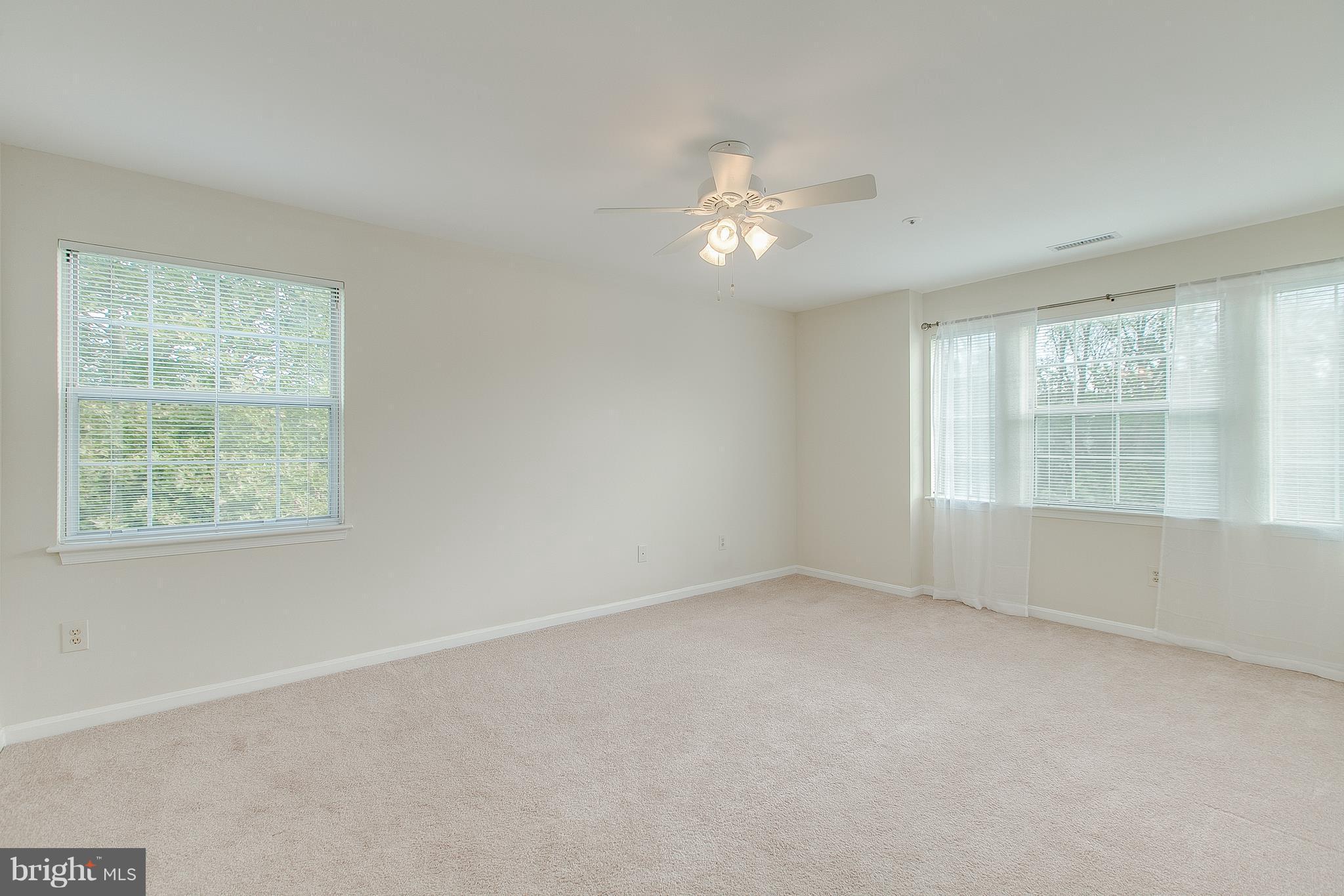 8601 Falls Run Road, Unit F Ellicott City, MD 21043 - Photo 12 of 17 an empty room with a window
