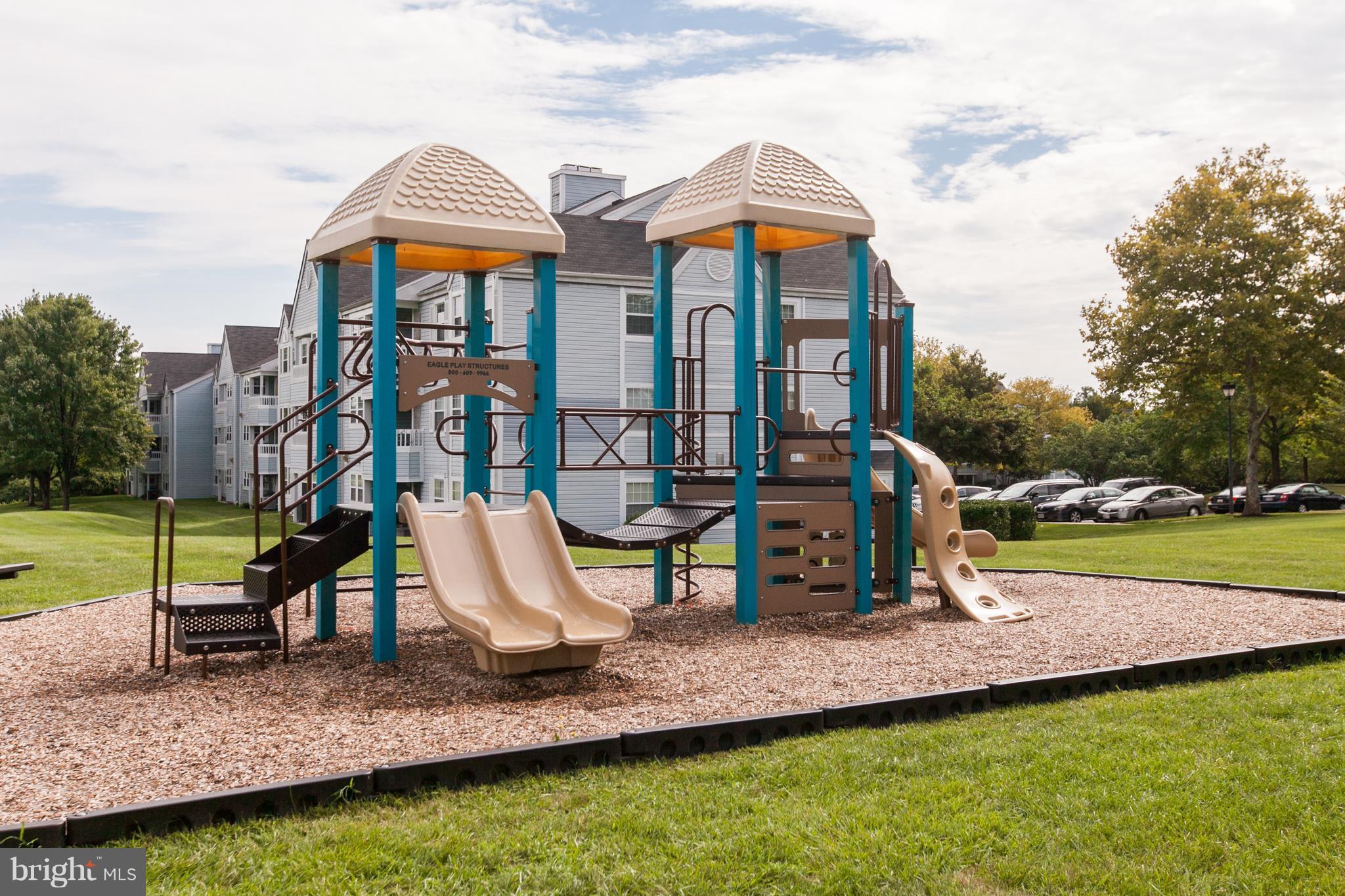 8601 Falls Run Road, Unit F Ellicott City, MD 21043 - Photo 17 of 17 a view of a park with slide