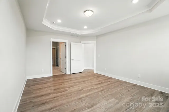 a bathroom with a shower sink and mirror