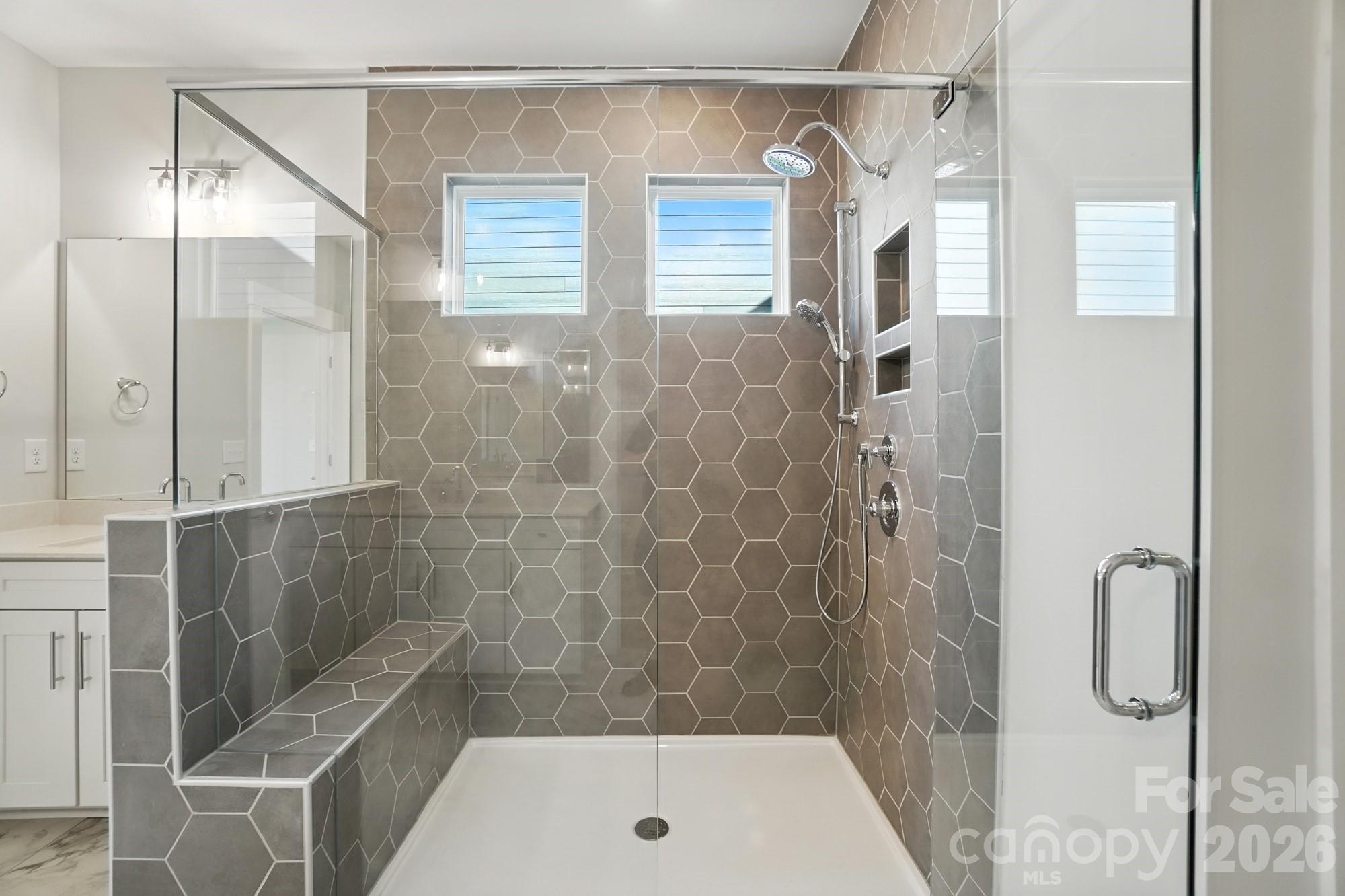 2007 Mantle Rdg Drive Indian Trail, NC 28079 - Photo 24 of 48 a bathroom with a shower and a tub