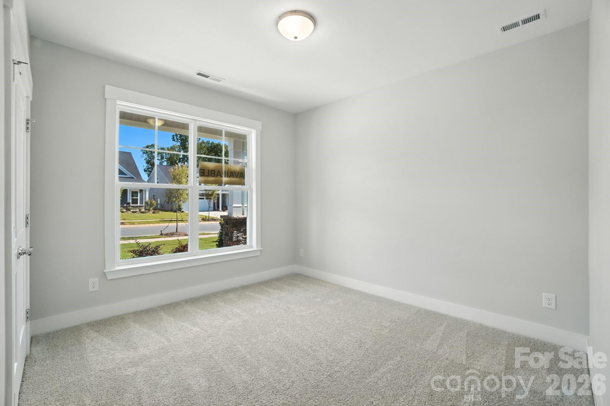 2007 Mantle Rdg Drive Indian Trail, NC 28079 - Photo 28 of 48 an empty room with windows