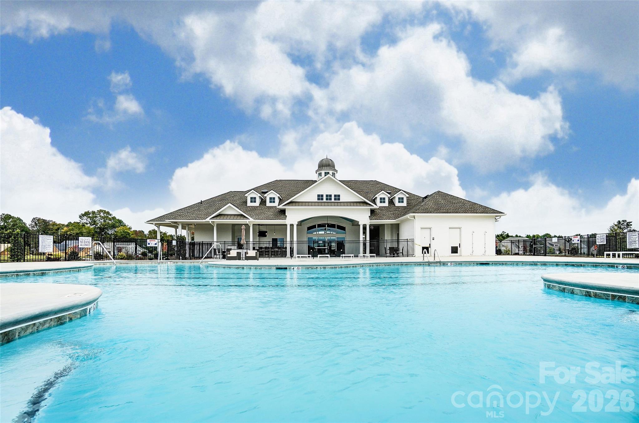 2007 Mantle Rdg Drive Indian Trail, NC 28079 - Photo 47 of 48 a white house with a big yard and large trees