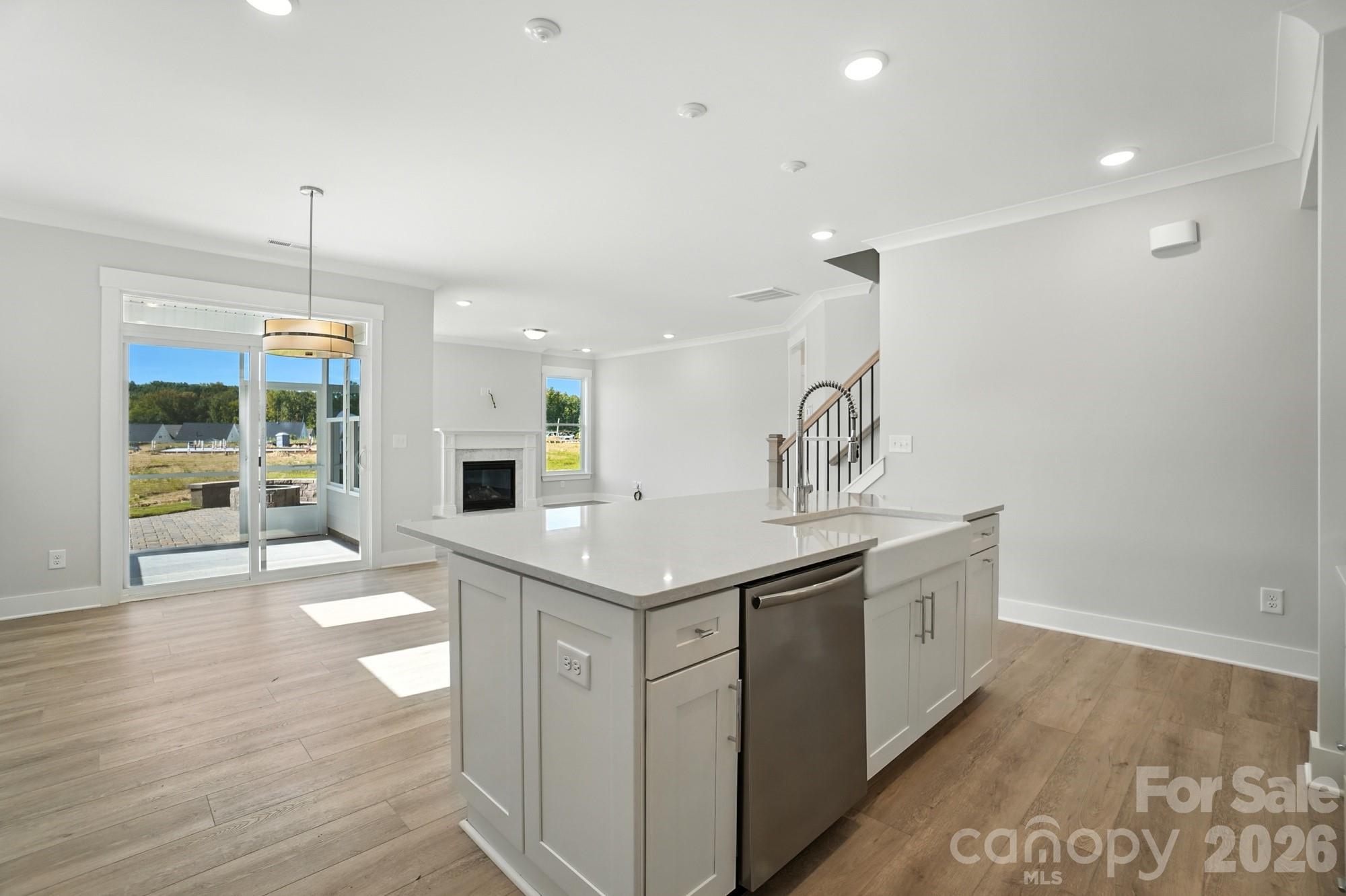 2007 Mantle Rdg Drive Indian Trail, NC 28079 - Photo 9 of 48 a kitchen with a sink and chandelier